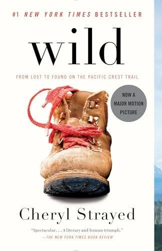 Book cover of Wild by Cheryl Strayed featuring a worn hiking boot with red laces, symbolizing adventure and wilderness exploration.