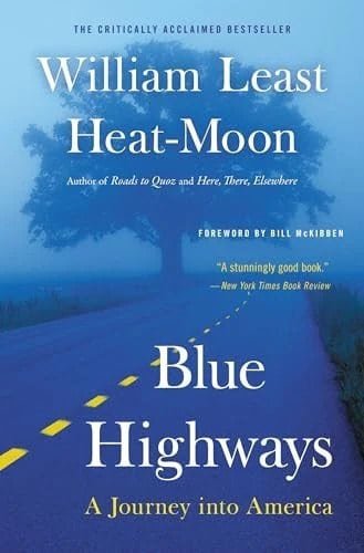 Book cover of Blue Highways by William Least Heat-Moon, featuring a blue-toned landscape with a winding road and trees.